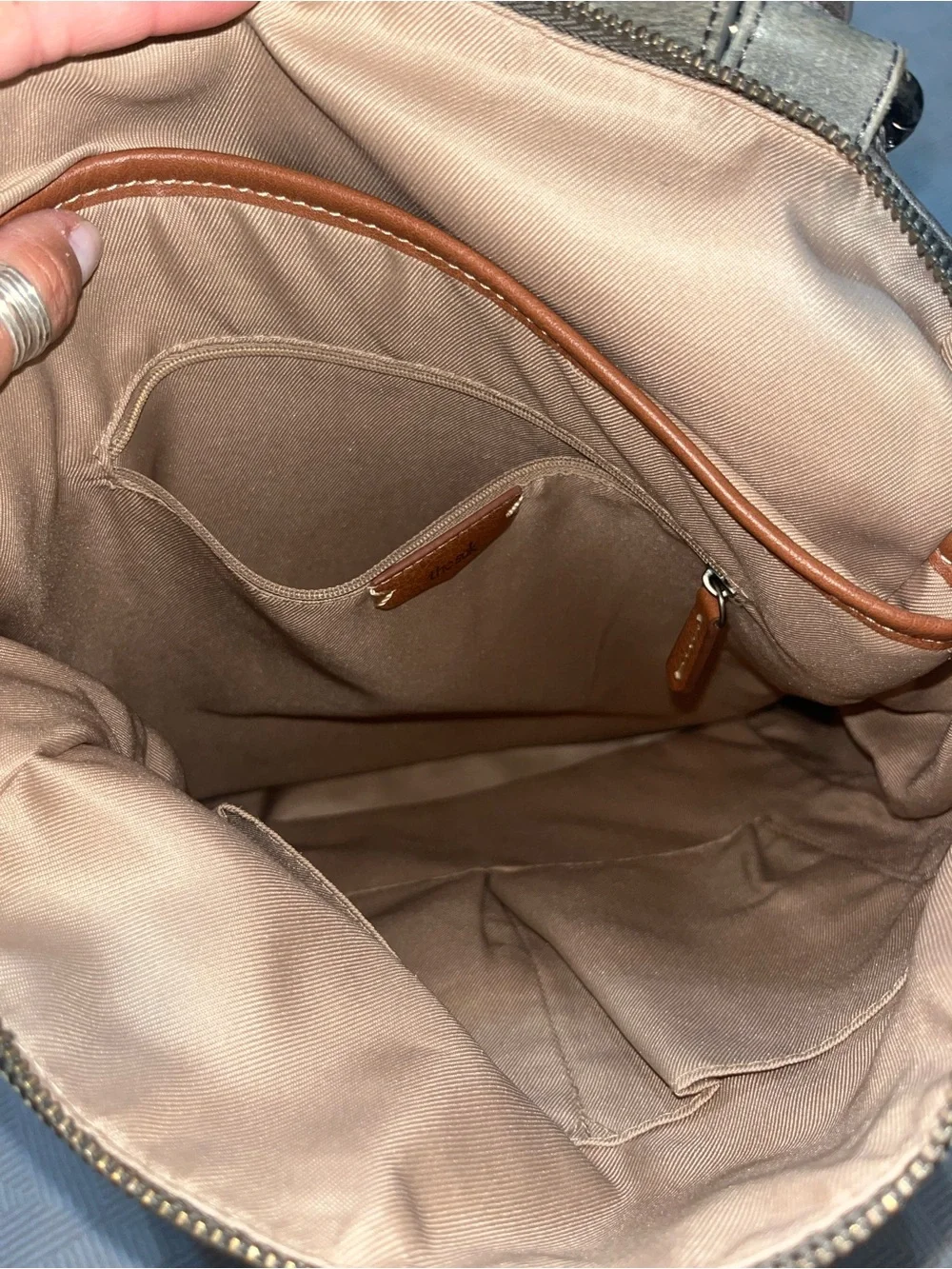 The Sak Metallic Gray Embossed Leather Backpack